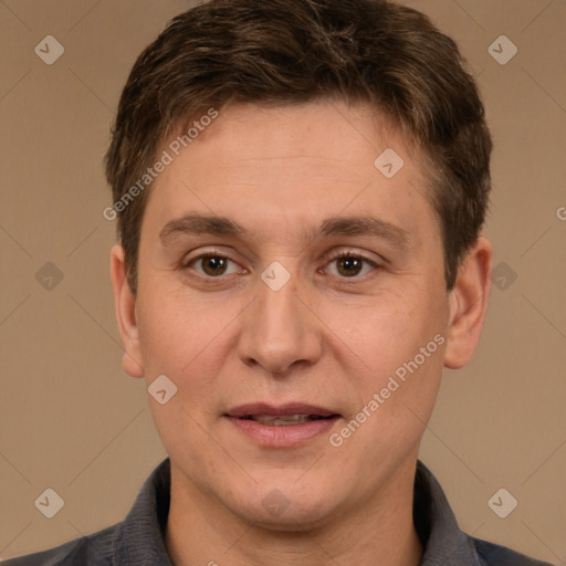 Joyful white adult male with short  brown hair and brown eyes