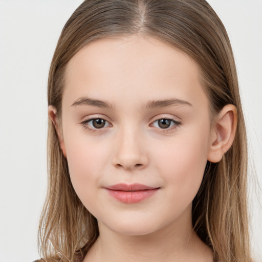 Joyful white child female with long  brown hair and brown eyes