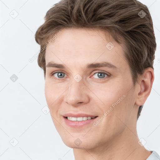 Joyful white young-adult female with short  brown hair and grey eyes