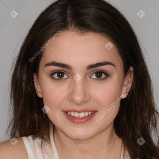 Joyful white young-adult female with medium  brown hair and brown eyes