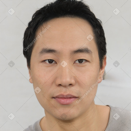 Neutral asian young-adult male with short  black hair and brown eyes