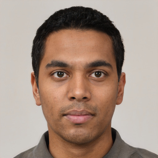 Neutral latino young-adult male with short  black hair and brown eyes