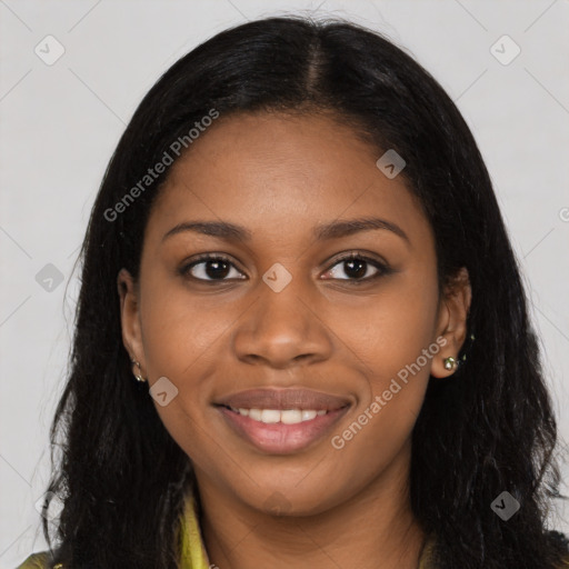 Joyful black young-adult female with long  black hair and brown eyes