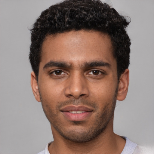 Neutral black young-adult male with short  brown hair and brown eyes