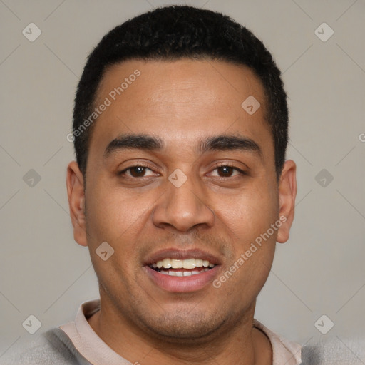 Joyful latino young-adult male with short  black hair and brown eyes