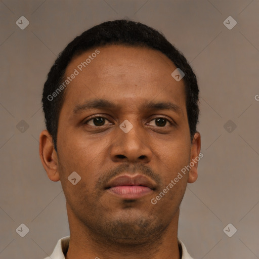 Neutral black young-adult male with short  brown hair and brown eyes
