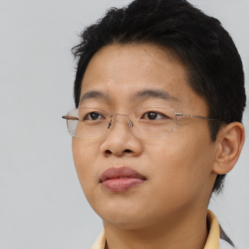 Neutral asian young-adult male with short  brown hair and brown eyes