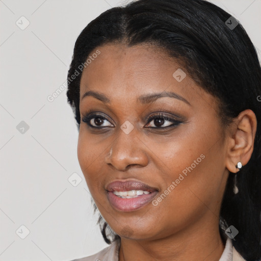 Joyful black young-adult female with medium  black hair and brown eyes