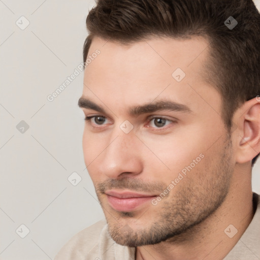 Neutral white young-adult male with short  brown hair and brown eyes