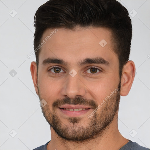 Joyful white young-adult male with short  brown hair and brown eyes