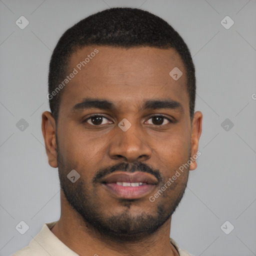 Joyful black young-adult male with short  brown hair and brown eyes
