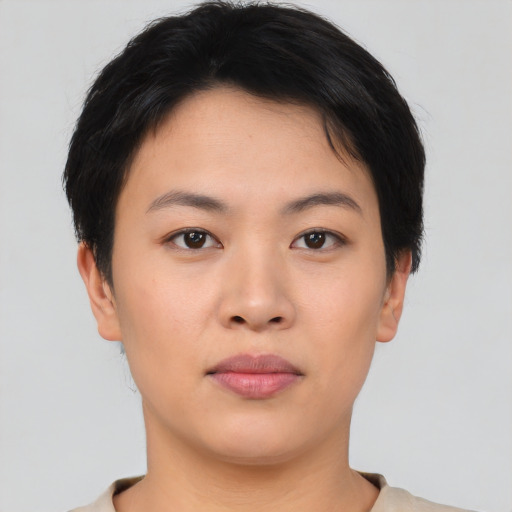 Neutral asian young-adult female with short  brown hair and brown eyes