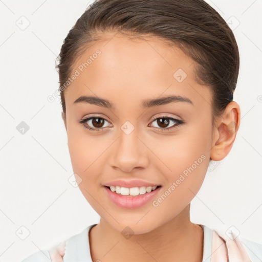 Joyful white child female with medium  brown hair and brown eyes