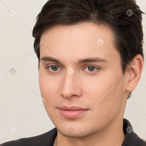 Neutral white young-adult male with short  brown hair and brown eyes