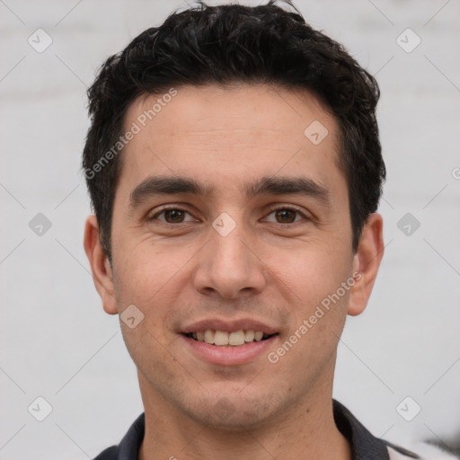 Joyful white young-adult male with short  black hair and brown eyes