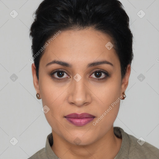 Joyful latino young-adult female with short  brown hair and brown eyes