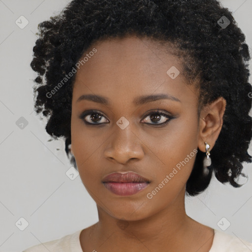 Neutral black young-adult female with medium  black hair and brown eyes