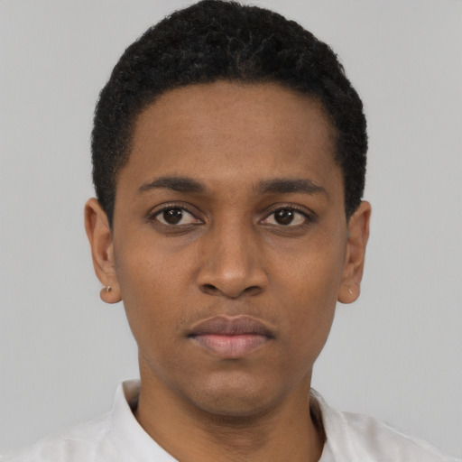 Neutral black young-adult male with short  black hair and brown eyes