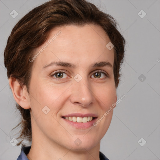 Joyful white adult female with medium  brown hair and grey eyes