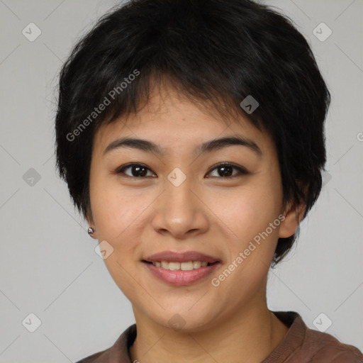 Joyful asian young-adult female with short  brown hair and brown eyes