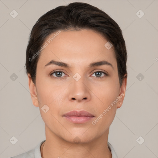 Neutral white young-adult female with short  brown hair and brown eyes