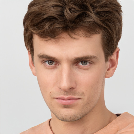 Neutral white young-adult male with short  brown hair and brown eyes