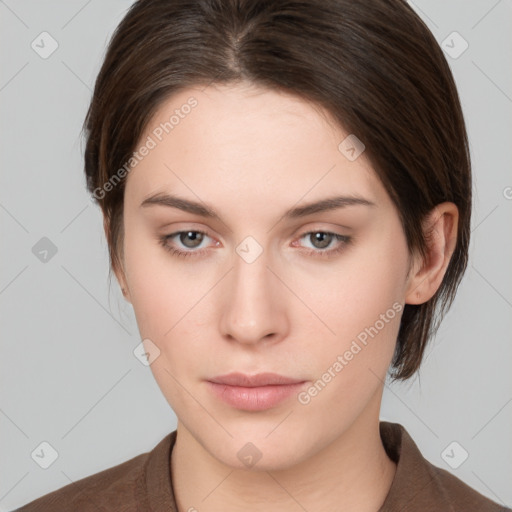 Neutral white young-adult female with medium  brown hair and brown eyes