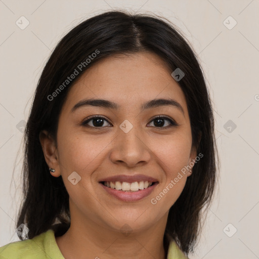 Joyful latino young-adult female with medium  brown hair and brown eyes