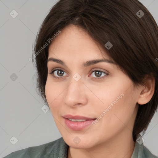 Neutral white young-adult female with medium  brown hair and brown eyes