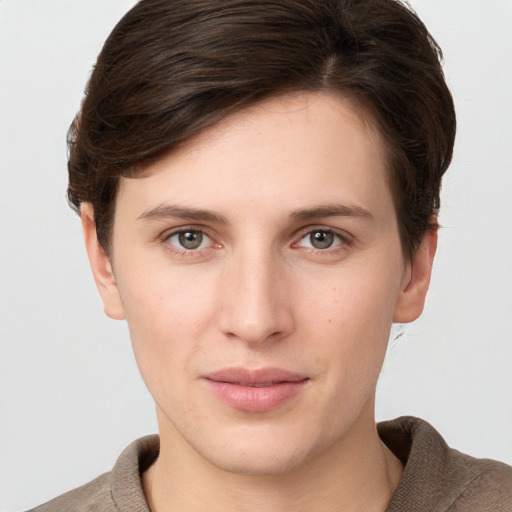 Neutral white young-adult female with short  brown hair and grey eyes