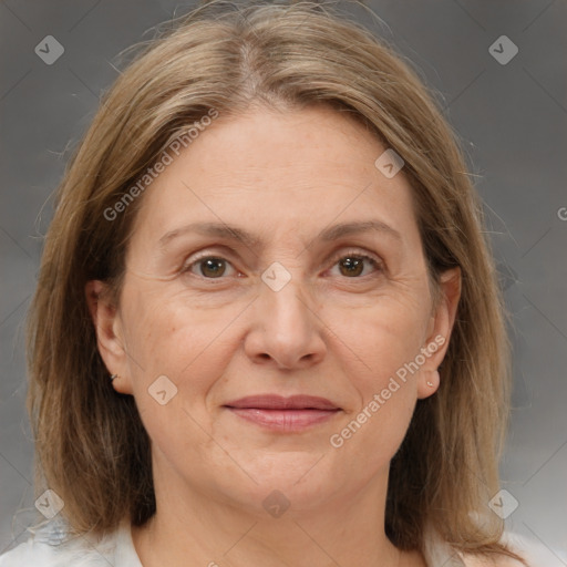 Joyful white adult female with medium  brown hair and brown eyes