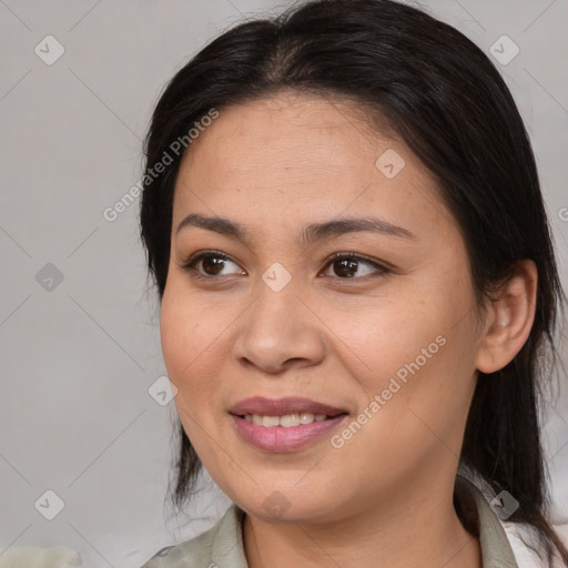 Joyful white young-adult female with medium  brown hair and brown eyes