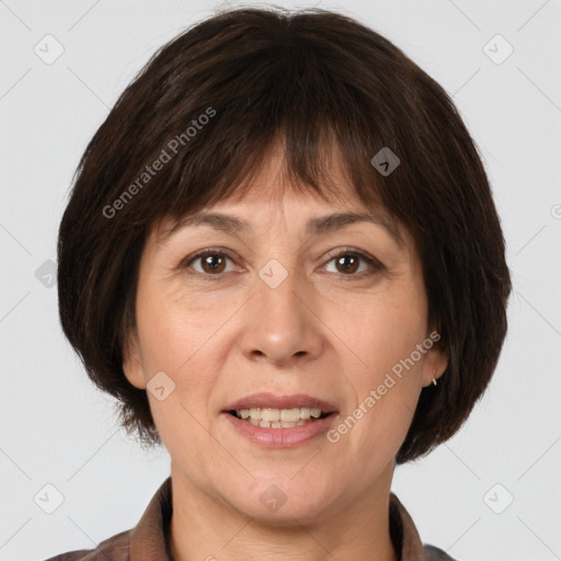 Joyful white adult female with medium  brown hair and brown eyes