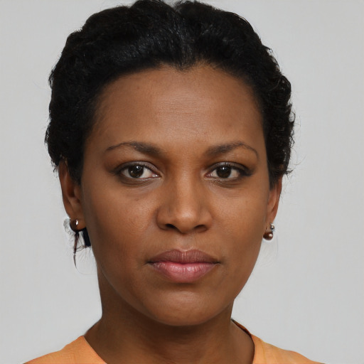 Neutral black young-adult female with short  black hair and brown eyes
