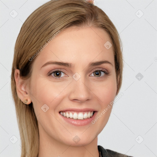 Joyful white young-adult female with medium  brown hair and grey eyes