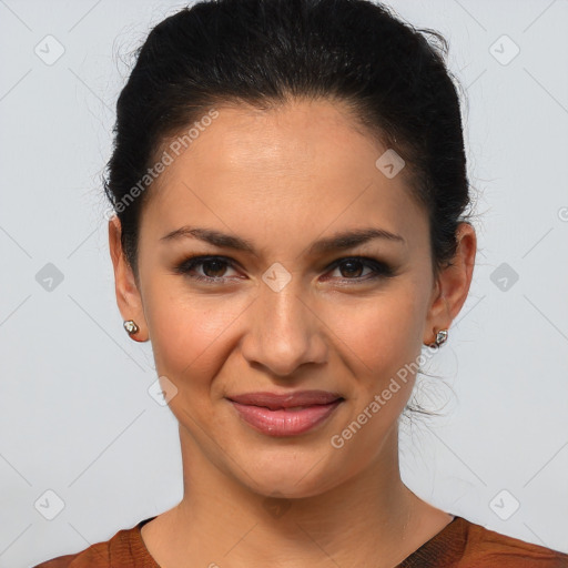 Joyful latino young-adult female with short  brown hair and brown eyes