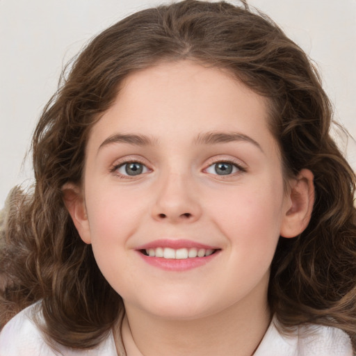 Joyful white child female with medium  brown hair and brown eyes