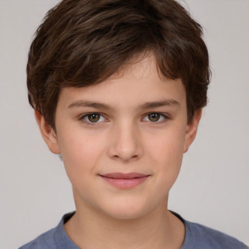 Joyful white child male with short  brown hair and brown eyes