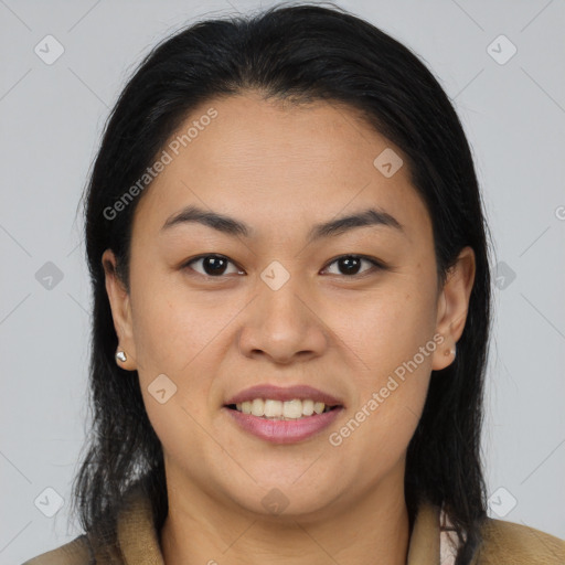 Joyful latino young-adult female with medium  brown hair and brown eyes