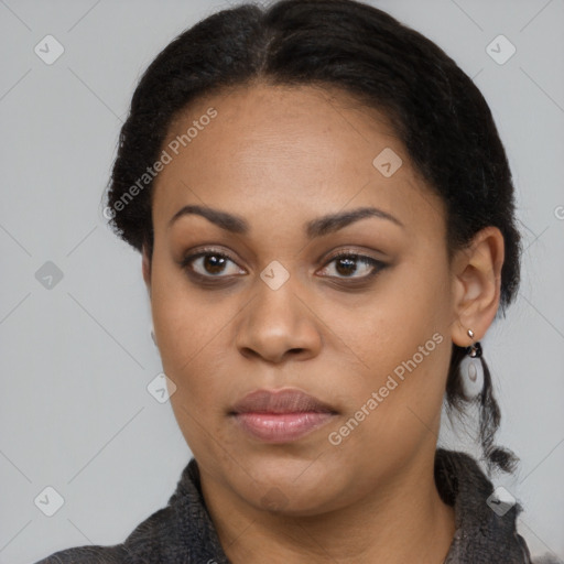 Joyful black young-adult female with medium  black hair and brown eyes