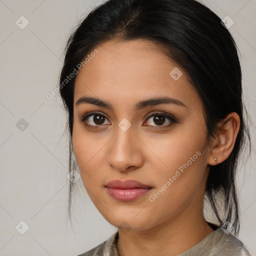 Joyful asian young-adult female with medium  brown hair and brown eyes