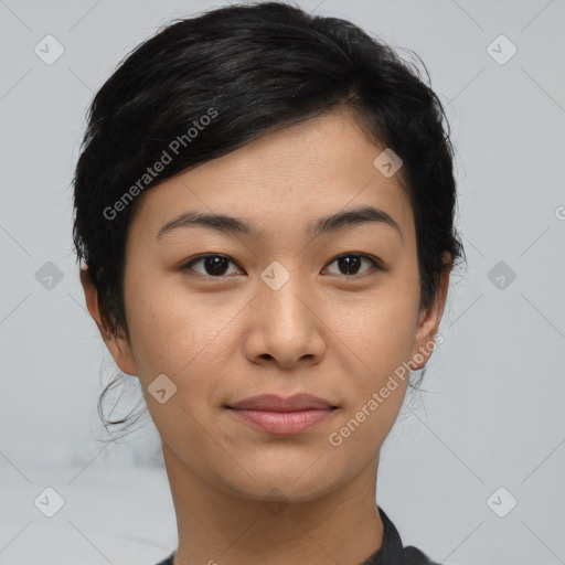 Joyful asian young-adult female with short  black hair and brown eyes