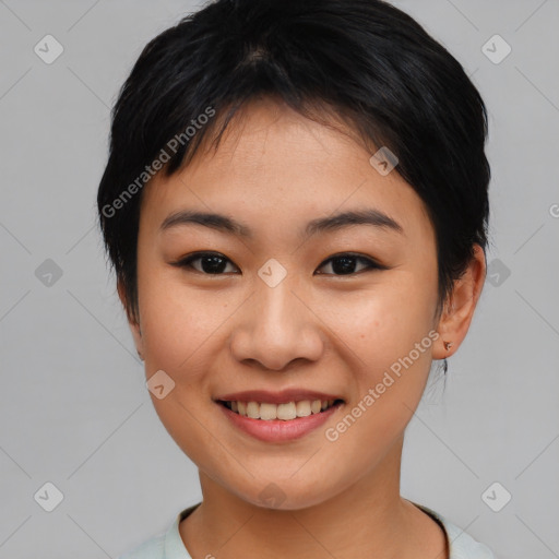 Joyful asian young-adult female with medium  black hair and brown eyes