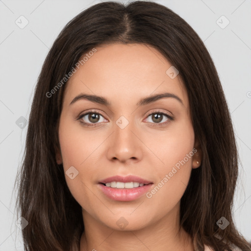 Joyful white young-adult female with long  brown hair and brown eyes