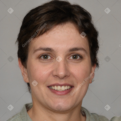 Joyful white adult female with short  brown hair and brown eyes