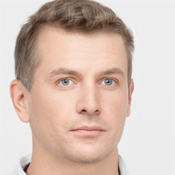 Neutral white young-adult male with short  brown hair and grey eyes