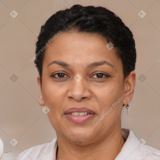 Joyful latino adult female with short  brown hair and brown eyes