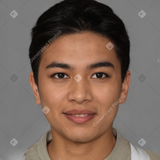 Joyful asian young-adult male with short  brown hair and brown eyes