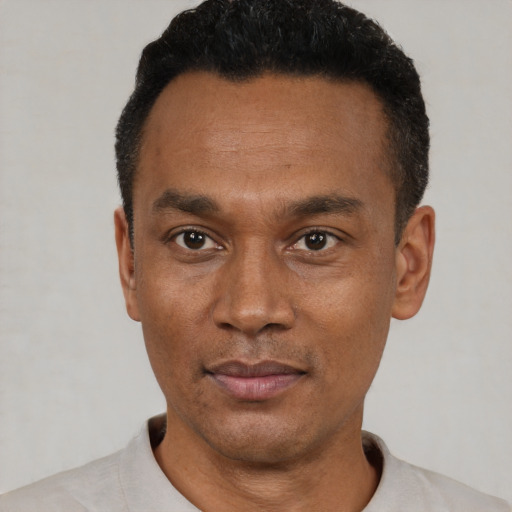 Neutral black adult male with short  black hair and brown eyes