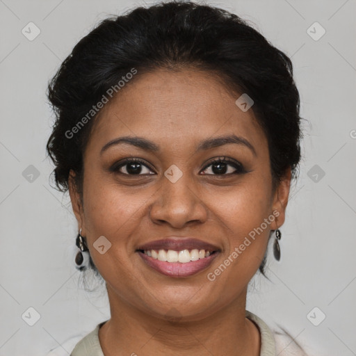 Joyful latino young-adult female with short  brown hair and brown eyes